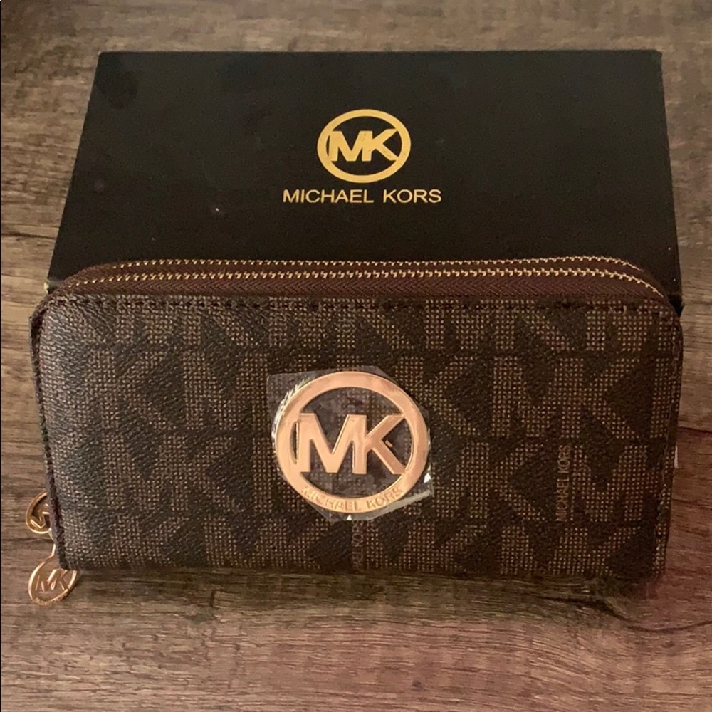 Brand new Michael Kors brown wallet.